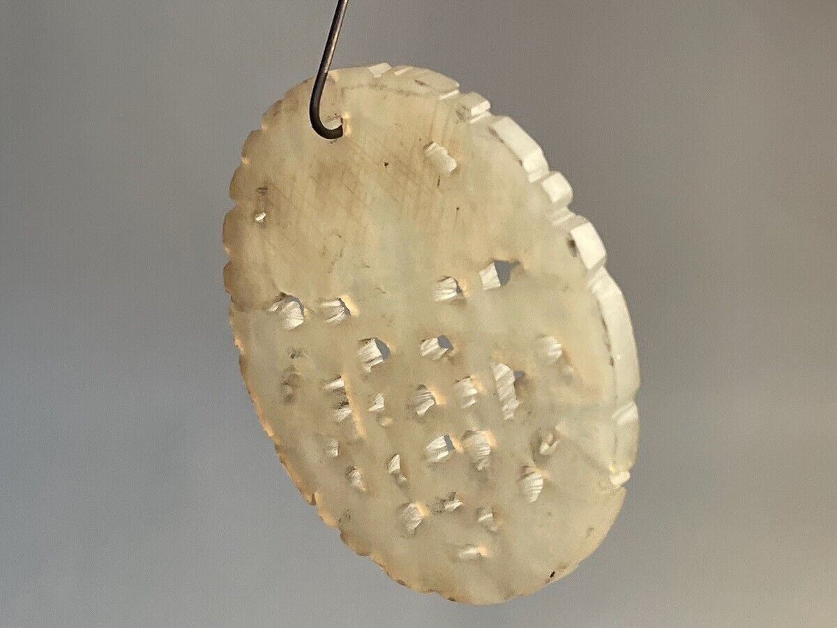 Vintage hand carved nephrite medallion - celadon jade pale green round