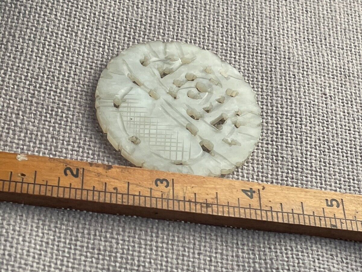 Vintage hand carved nephrite medallion - celadon jade pale green round
