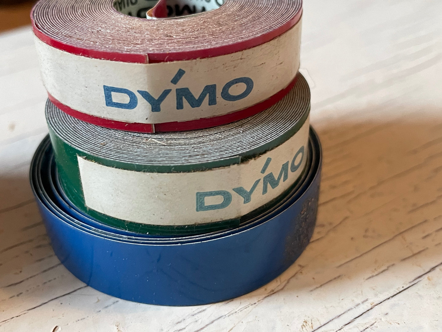 One roll of DYMO or compatible embossing tape in your choice of color and width (3/8, 1/2, 3/4”)