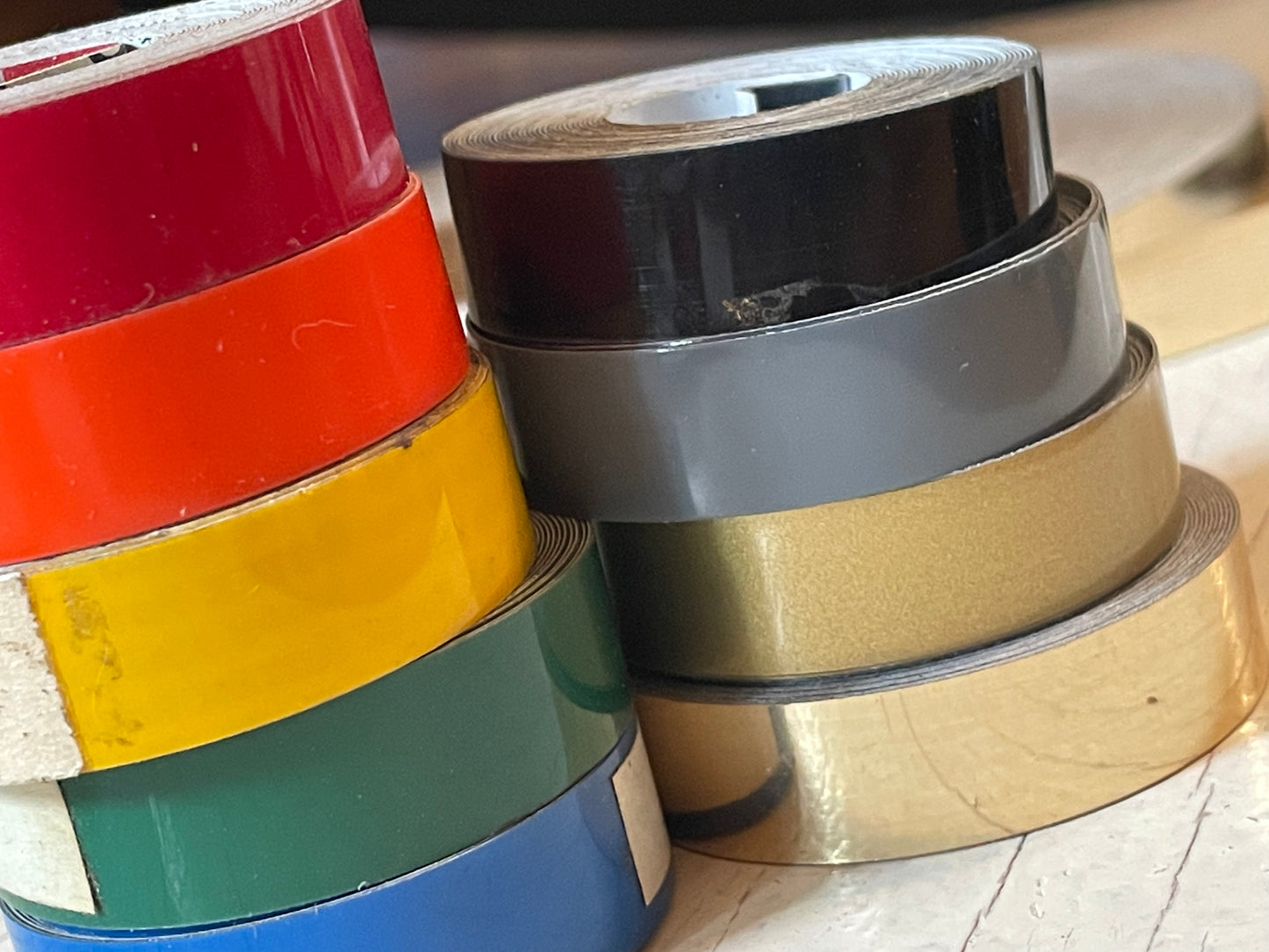 One roll of DYMO or compatible embossing tape in your choice of color and width (3/8, 1/2, 3/4”)