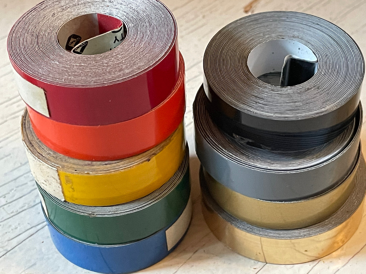 One roll of DYMO or compatible embossing tape in your choice of color and width (3/8, 1/2, 3/4”)