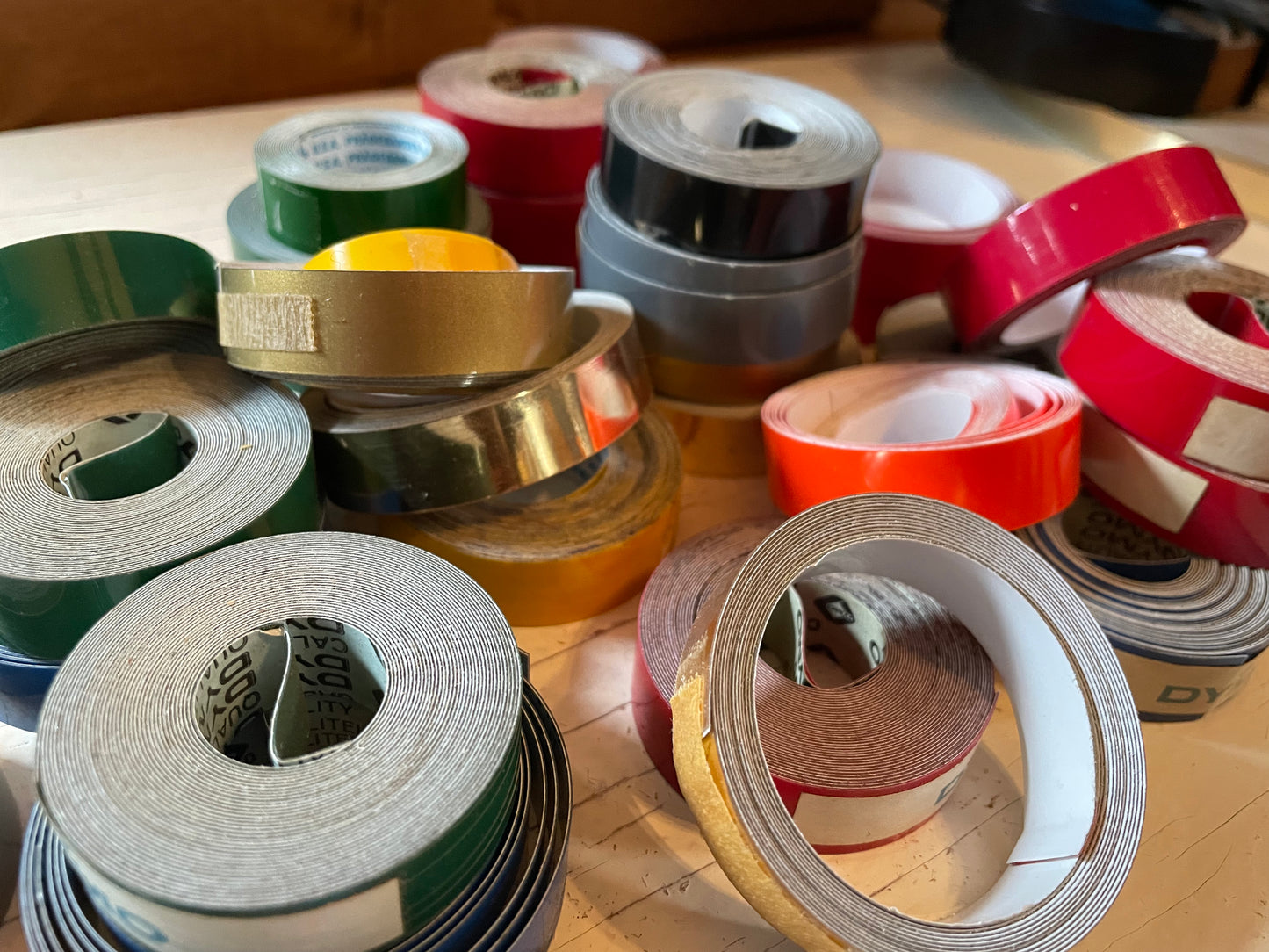 One roll of DYMO or compatible embossing tape in your choice of color and width (3/8, 1/2, 3/4”)