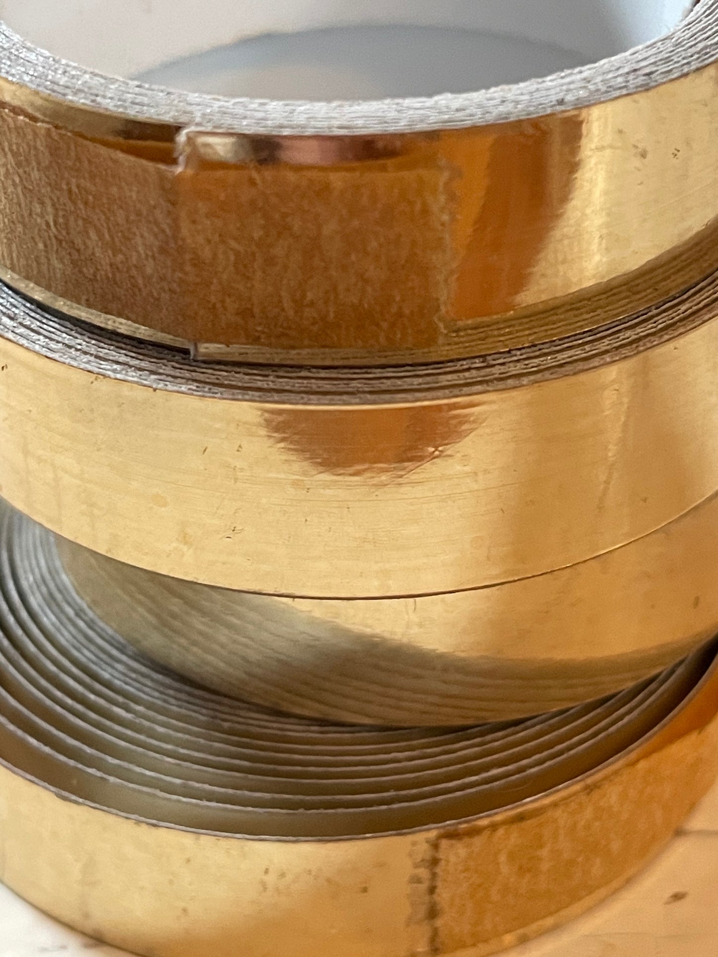 One roll of DYMO or compatible embossing tape in your choice of color and width (3/8, 1/2, 3/4”)