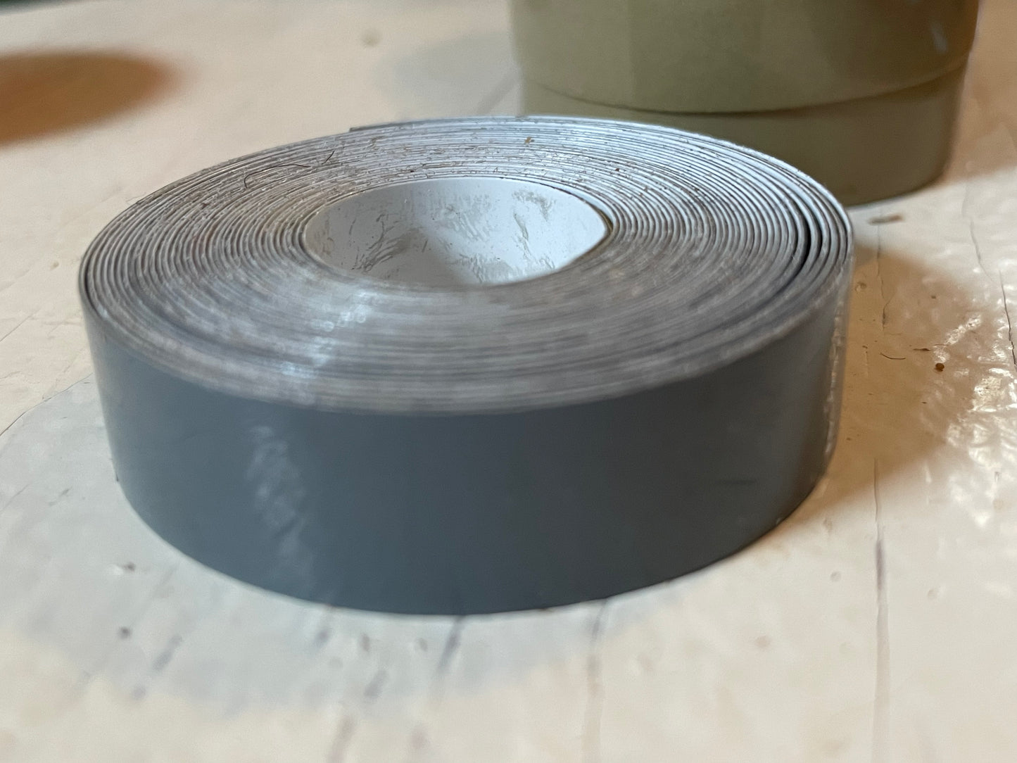 One roll of DYMO or compatible embossing tape in your choice of color and width (3/8, 1/2, 3/4”)