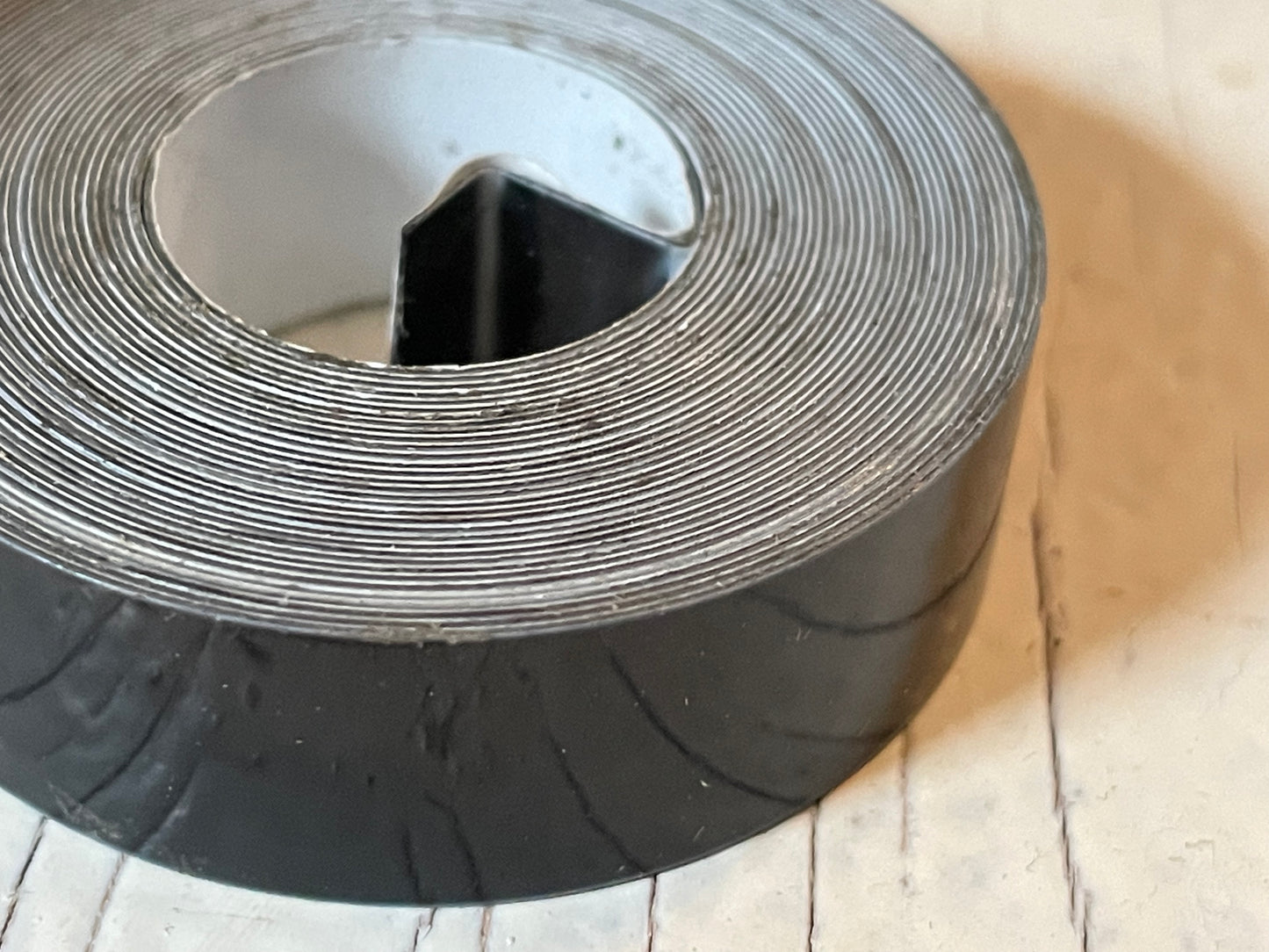 One roll of DYMO or compatible embossing tape in your choice of color and width (3/8, 1/2, 3/4”)