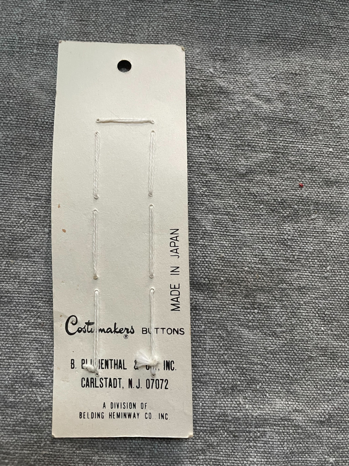 Back of original packaging card for 8 white costumakers sewing buttons, 7 mm, nos on original card