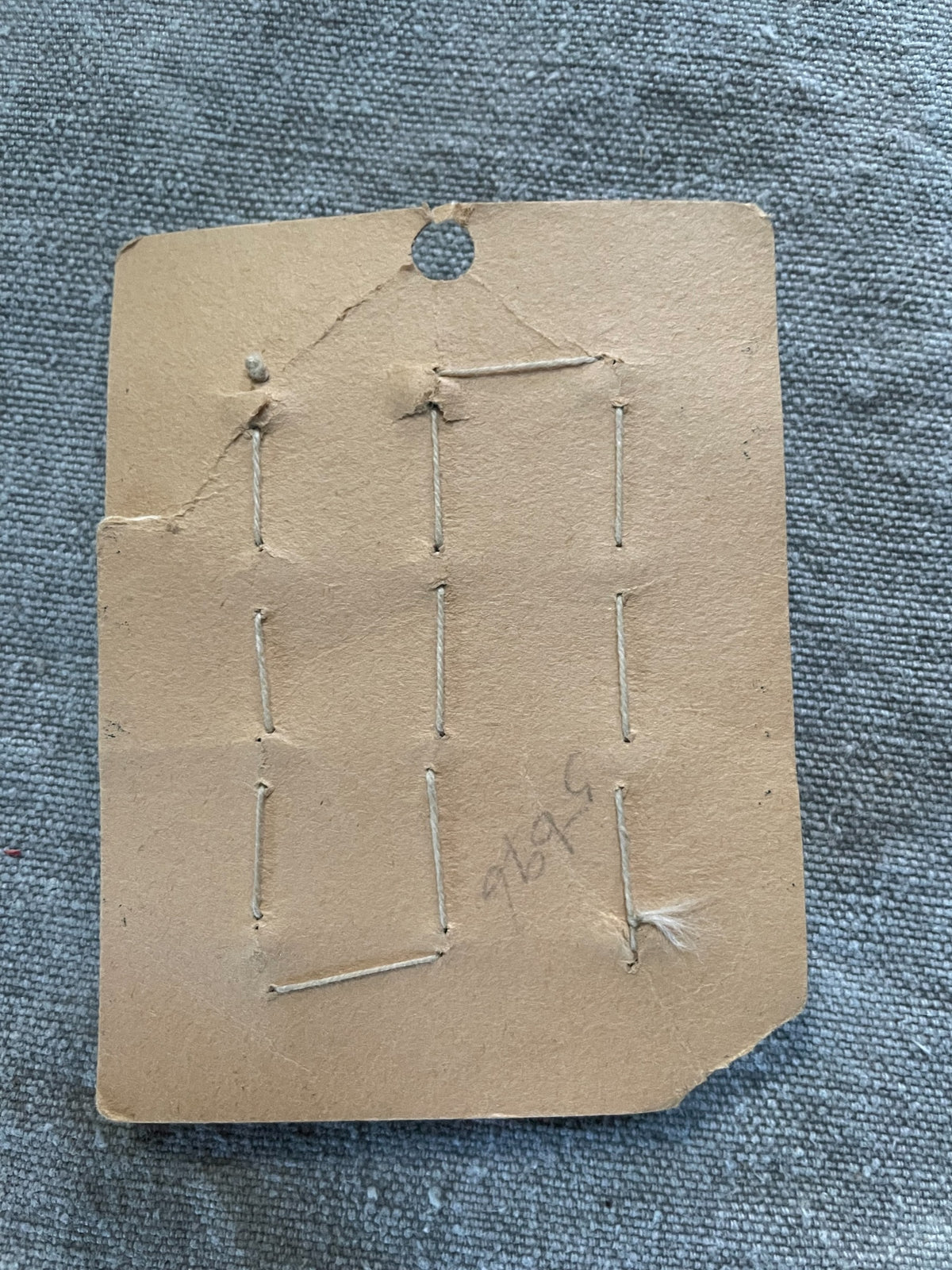 Back of original packaging card for 12 brown czech glass sewing buttons, 13.18 mm, nos on original card