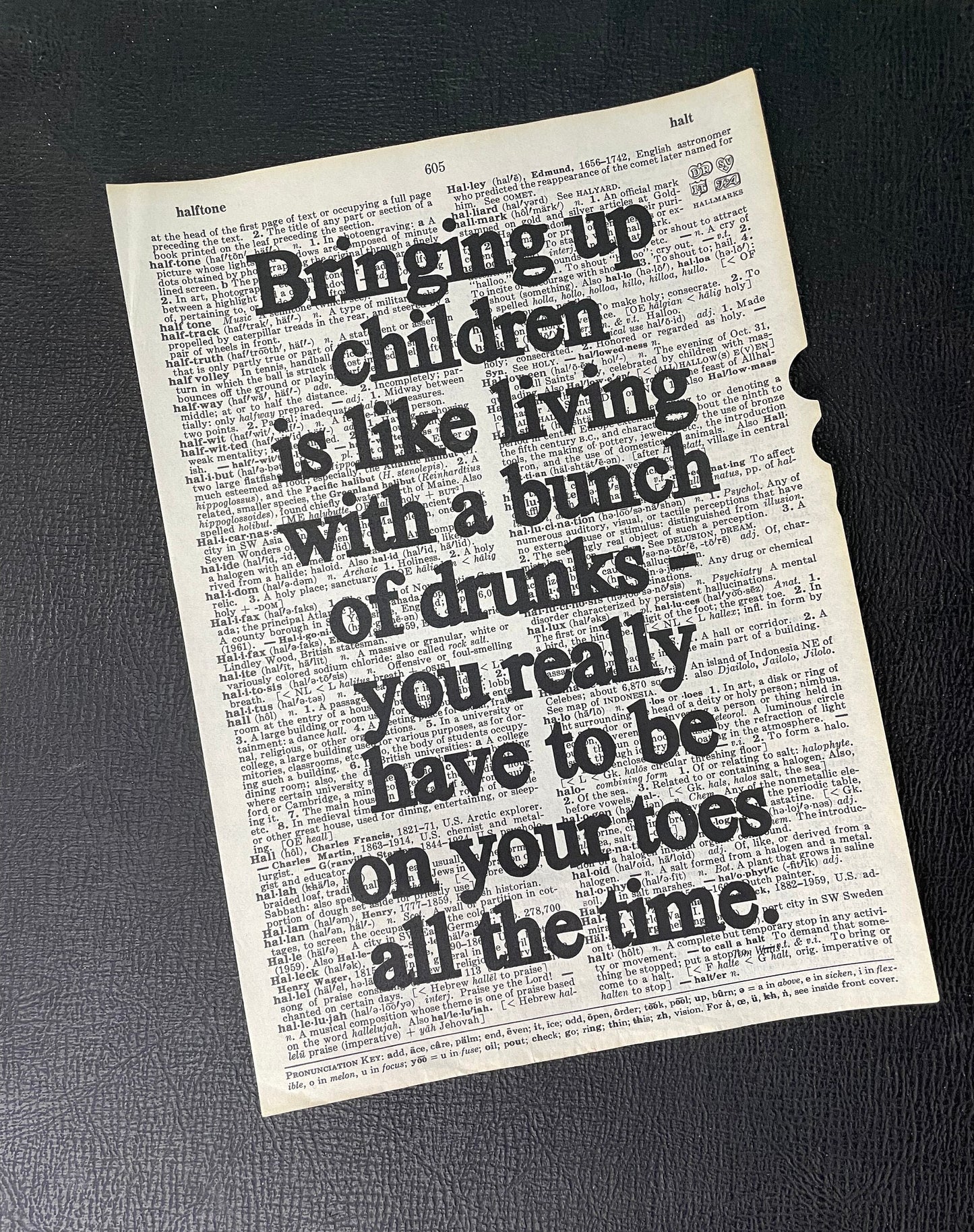 Print: Bringing up children is like living with a bunch of drunks - Tom Waits Quotation on Repurposed Broken Dictionary Book Page