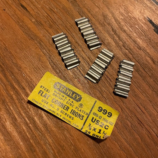 Vintage corrugated corner irons/nails - set of four