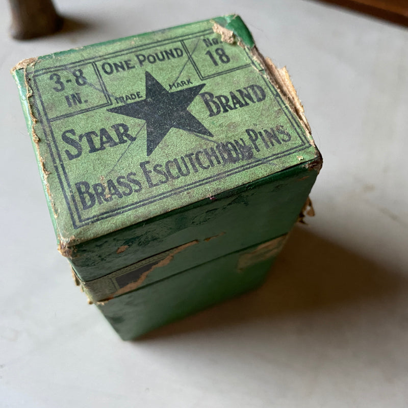 One dozen antique brass escutcheon nails