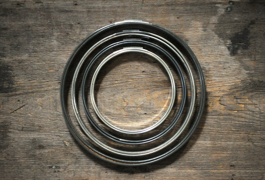 One vintage metal embroidery hoop, size 4" - 8", for visible mending, sewing supply / cork ring w/ spring tension or barrel closure frame