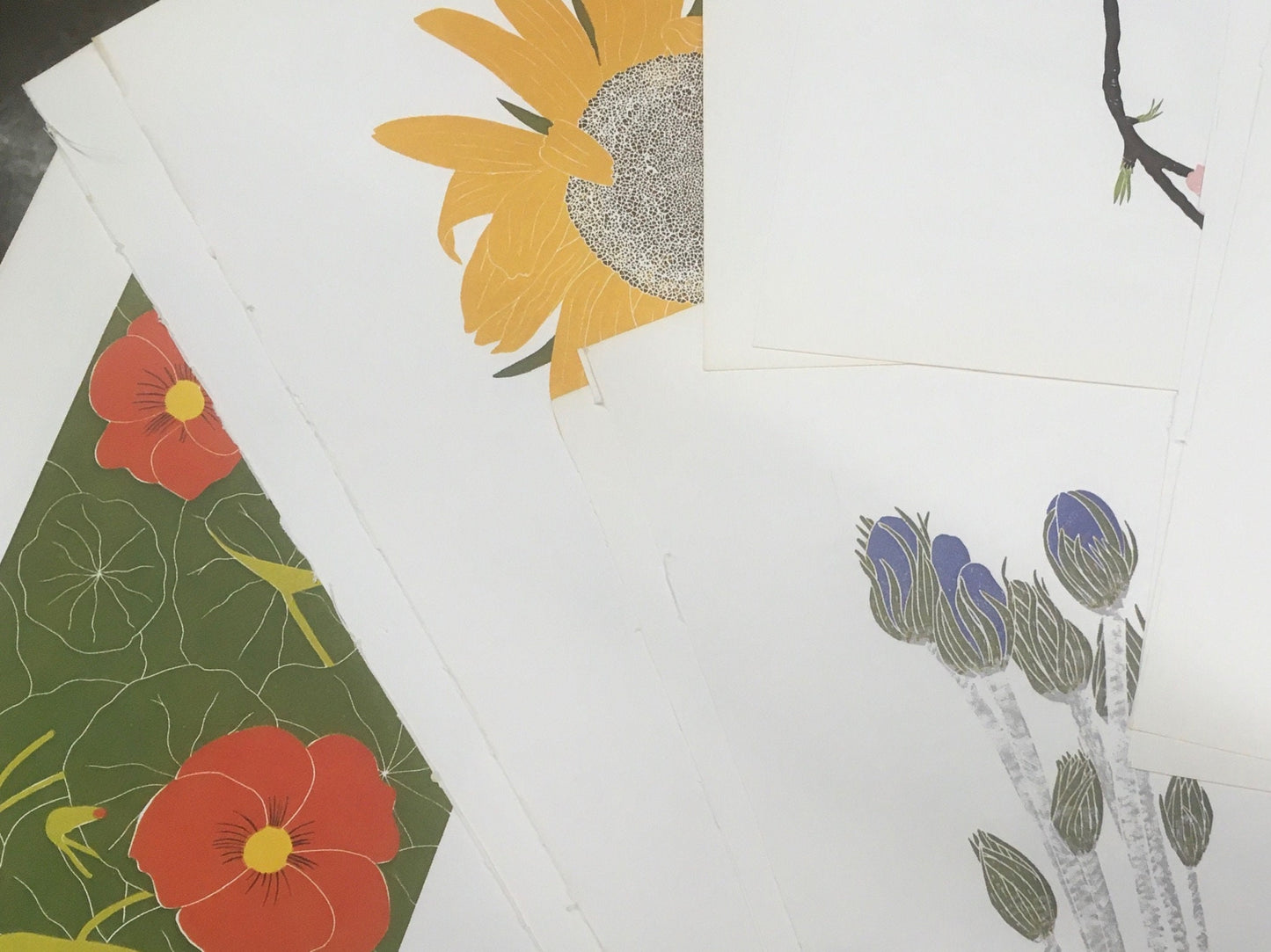 Four vintage bookplates featuring linocut botanical prints