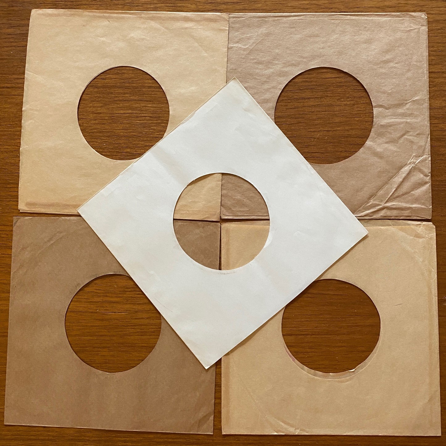 Five 45-sized paper sleeves for repurposing