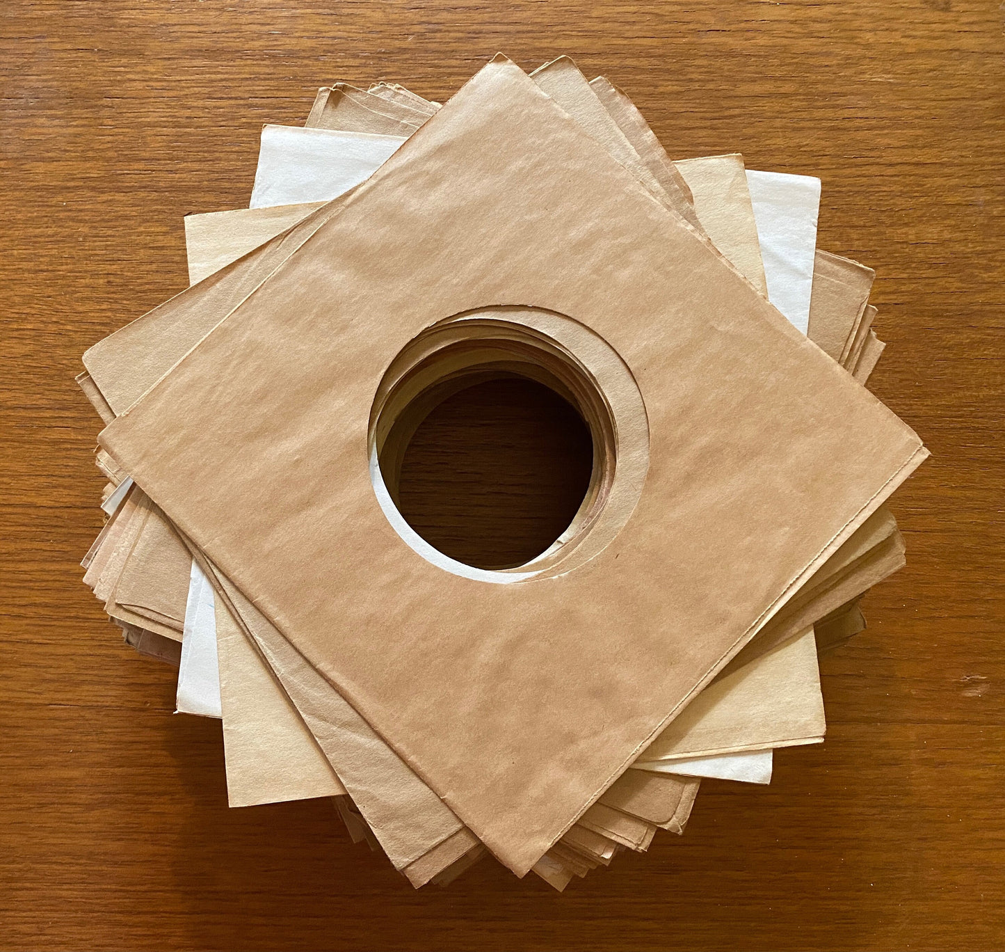 Five 45-sized paper sleeves for repurposing