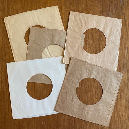 Five 45-sized paper sleeves for repurposing
