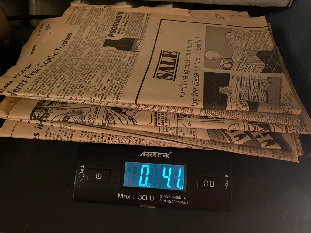 1/4 pound of vintage newspapers (1930s-1980s)