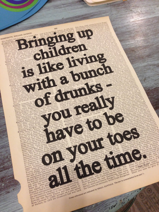 Print: Bringing up children is like living with a bunch of drunks - Tom Waits Quotation on Repurposed Broken Dictionary Book Page