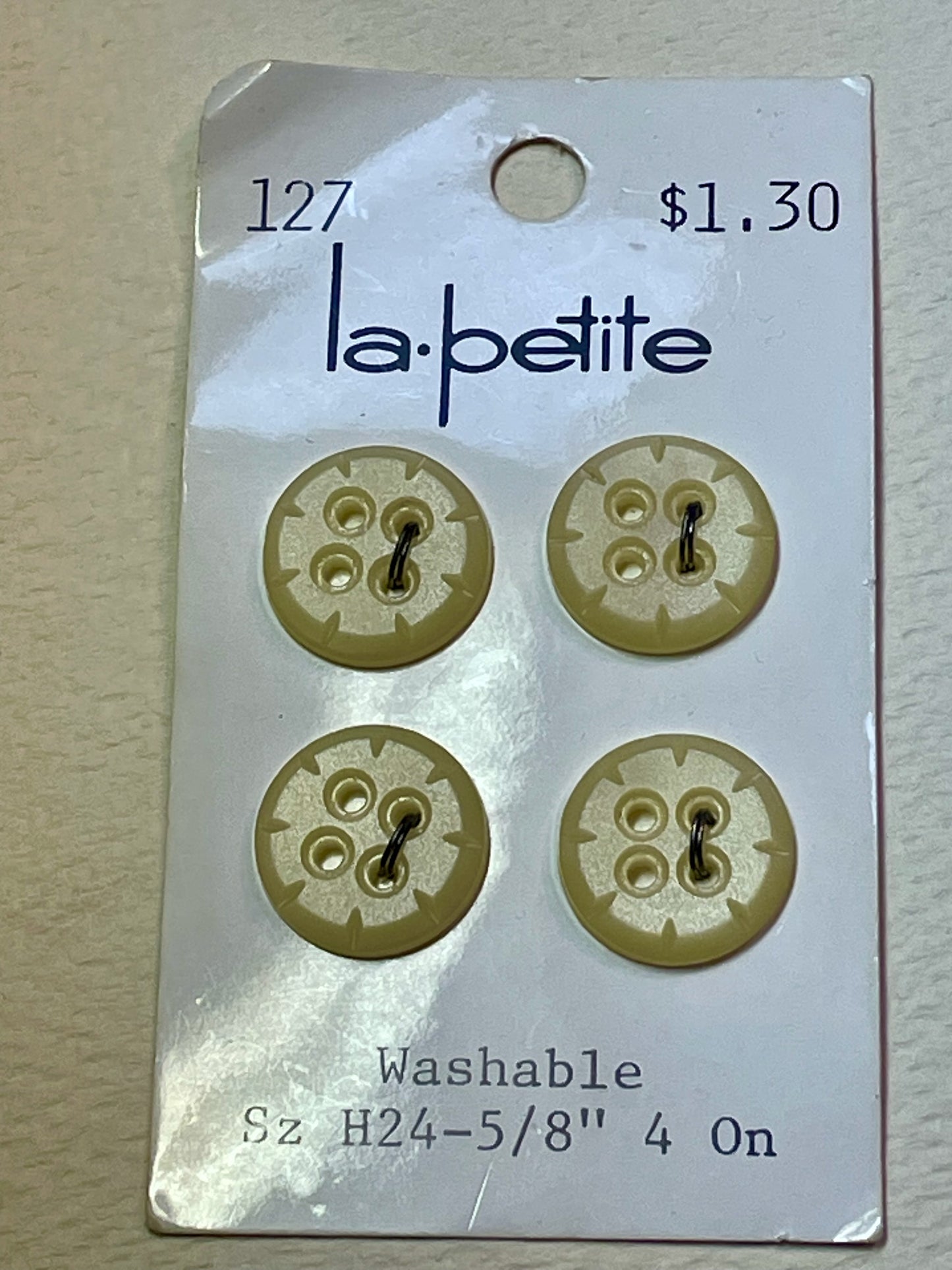 3 cream vtg plastic buttons | 4 hole flat | size 30/0.75" | new old stock