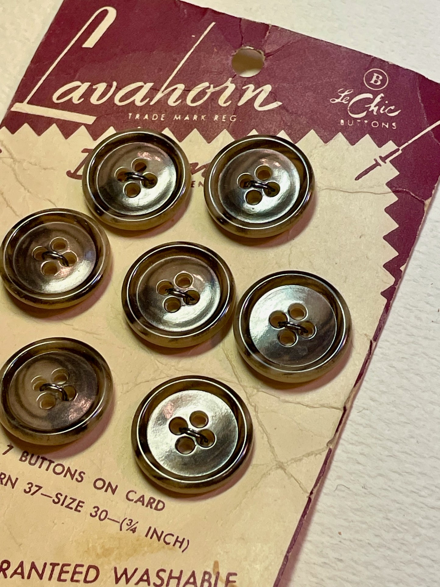 7 brown 1960s vtg Lavahorn faux horn buttons | 4 hole flat | size 30/0.75" | new old stock | made in USA