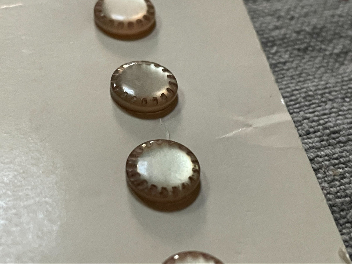 Close-up detail of 6 casa de leon decorative shank sewing buttons, 8.85 mm, nos