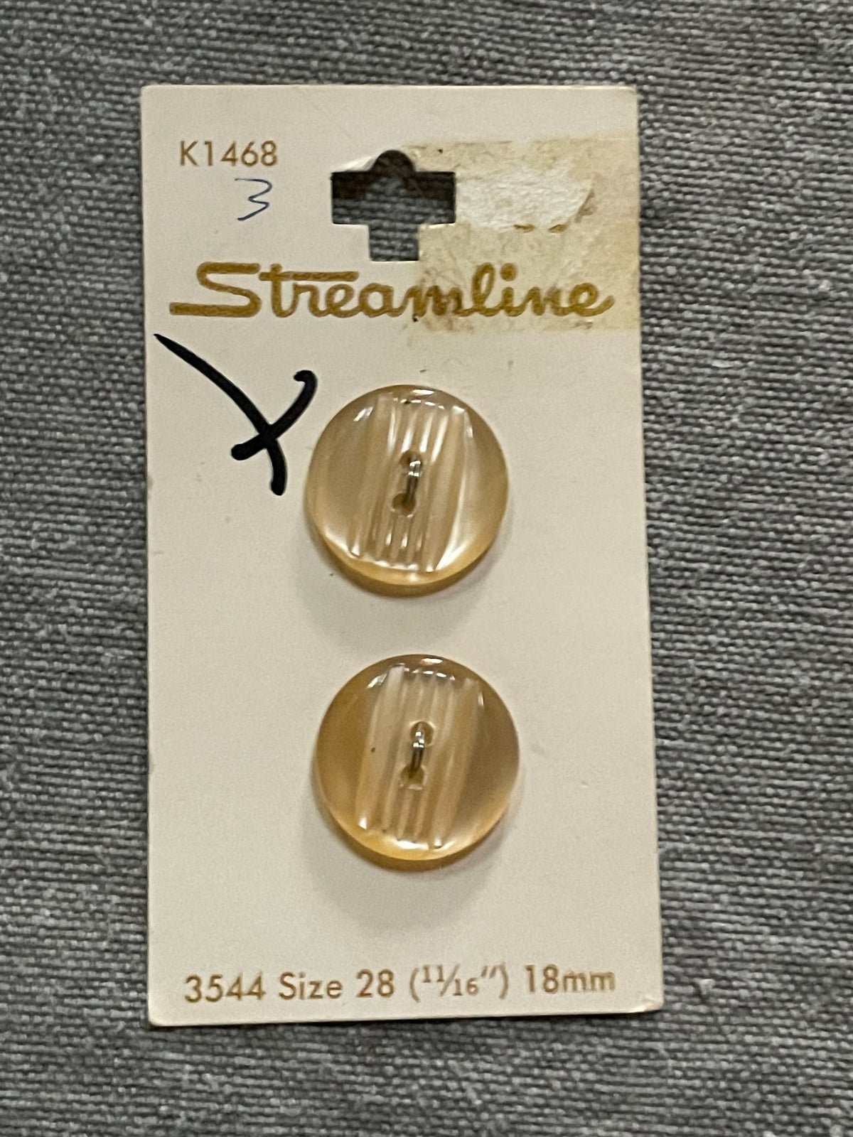 Product view of 2 beige streamline two-hole sewing buttons, 18 mm, nos on card