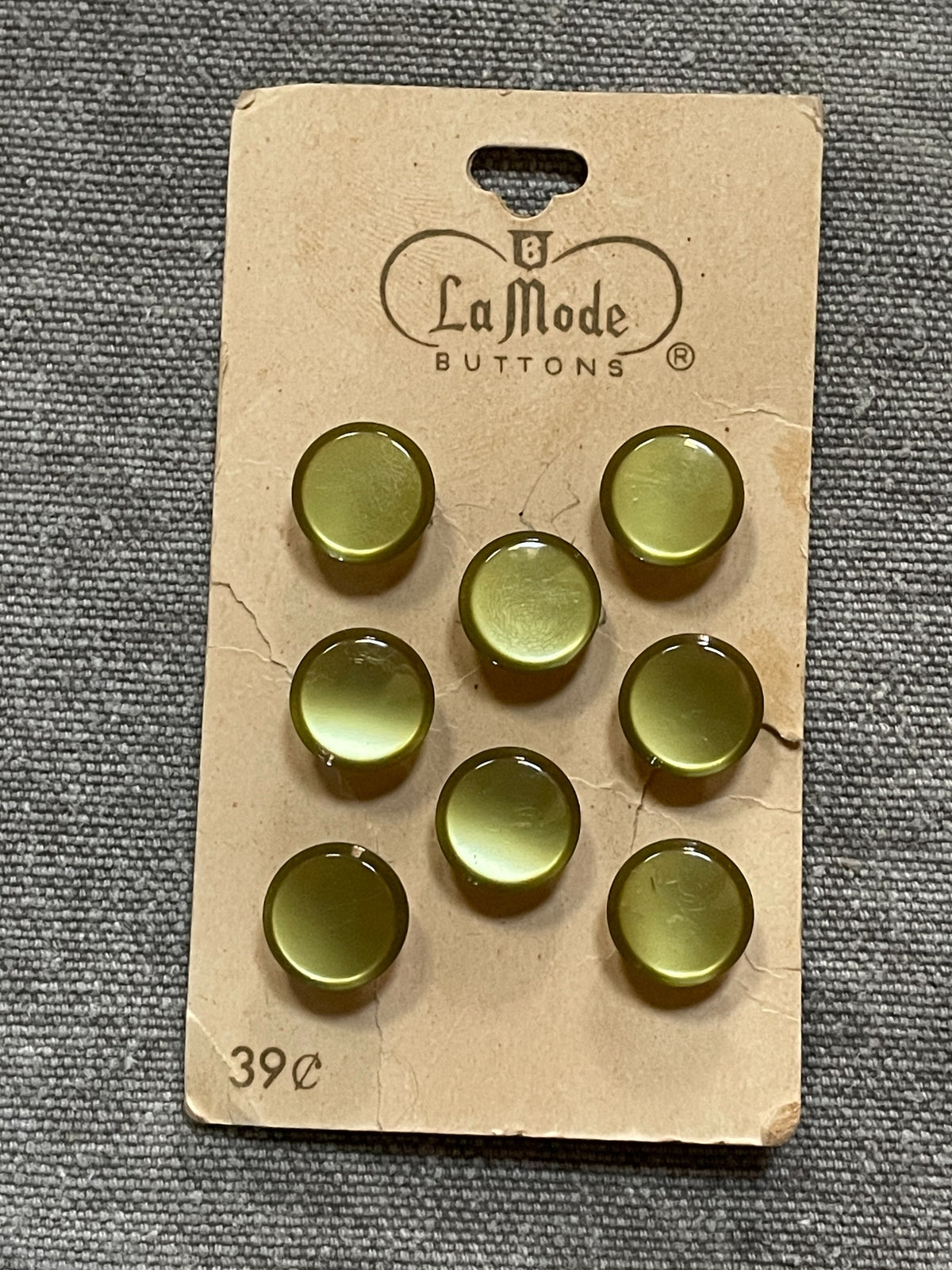 Product view of 8 green la mode shank sewing buttons, 7/16 inch, nos on card
