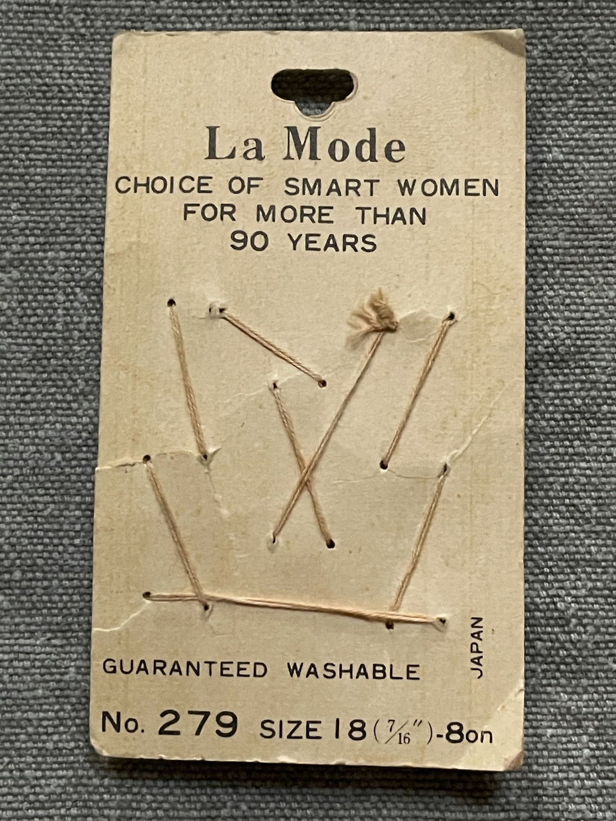 Back of original packaging card for 8 green la mode shank sewing buttons, 7/16 inch, nos on card