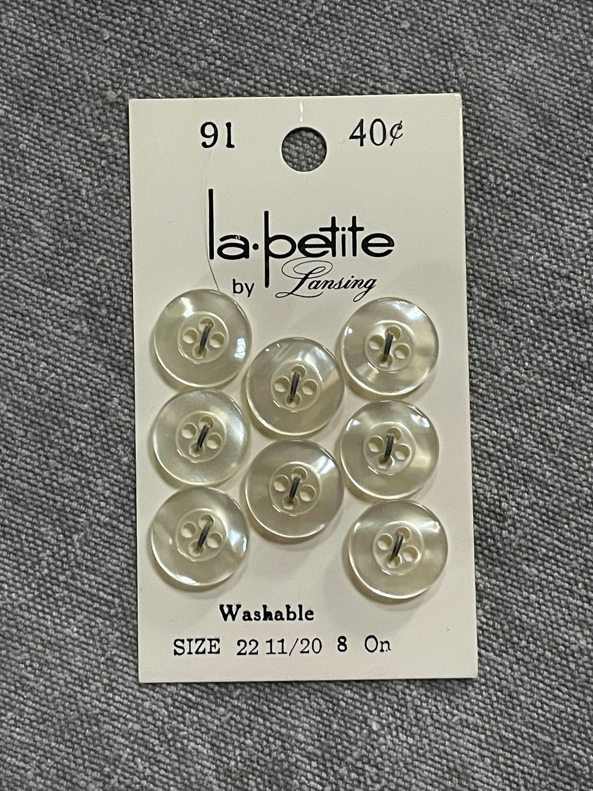 Product view of 8 pale la petite four-hole sewing buttons, 13.5 mm, nos on card