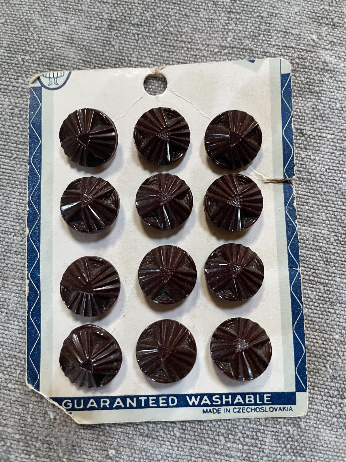 Product view of 12 brown czech glass sewing buttons, 13.18 mm, nos on original card