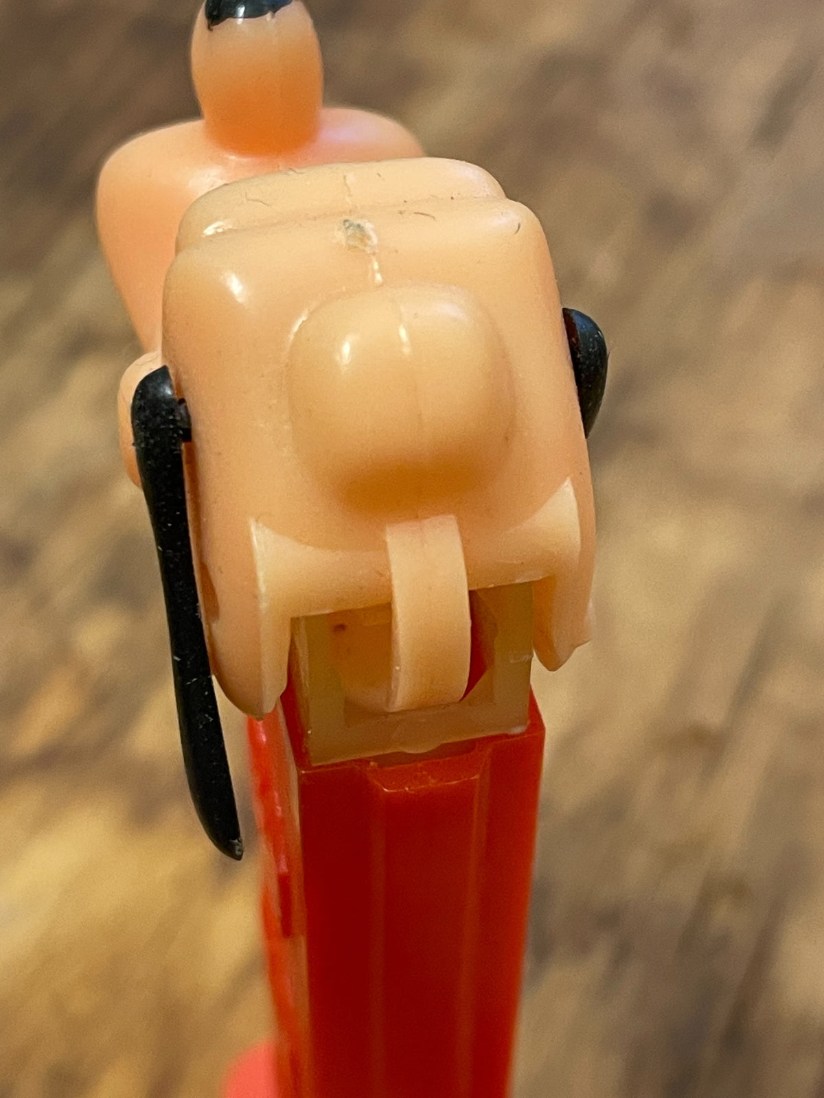 Close-up of Goofy head on vintage red-stem PEZ dispenser