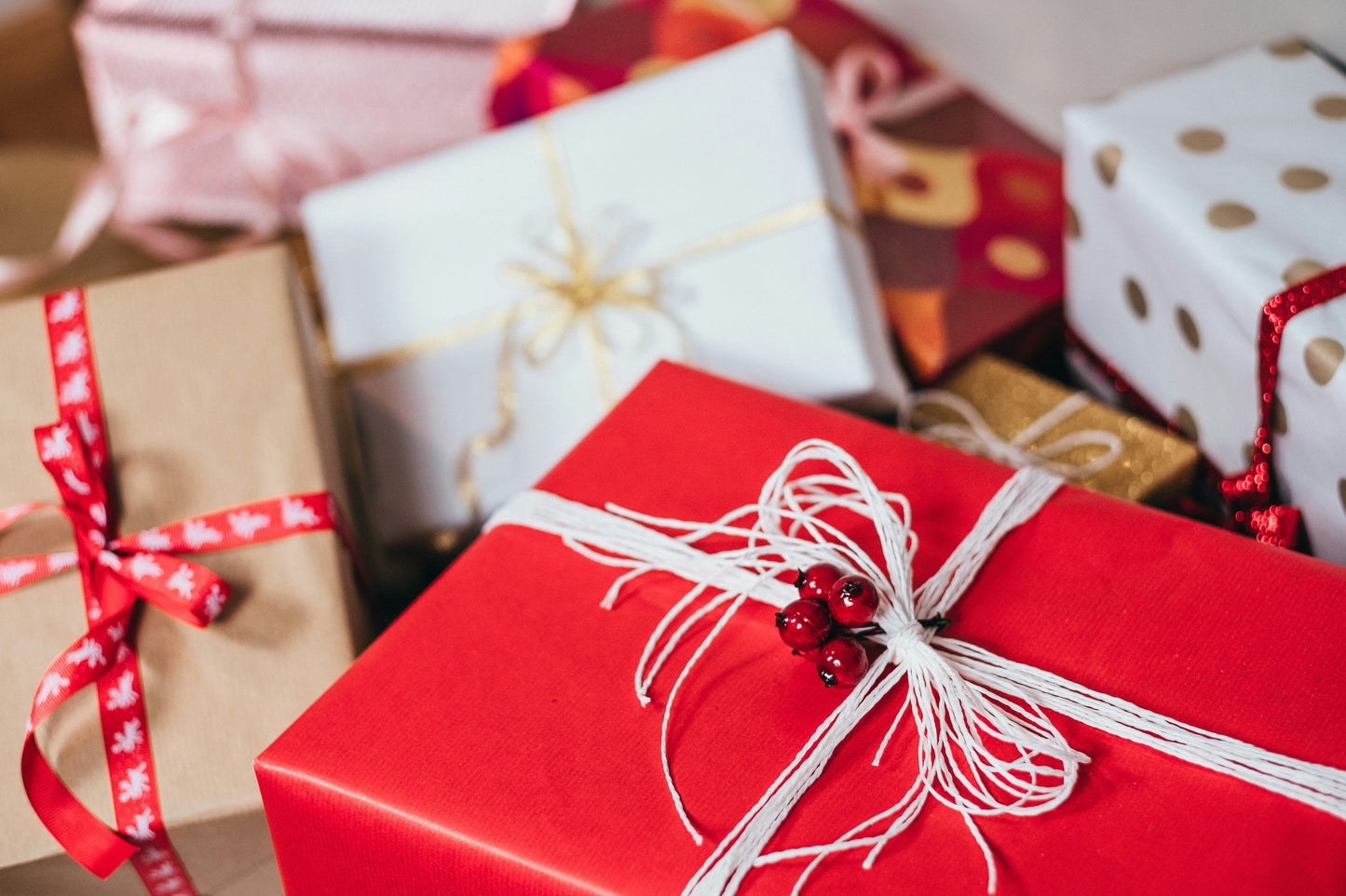 Photograph of holiday packages wrapped up wih ribbons. Photo by <a href="https://unsplash.com/@freestocks?utm_content=creditCopyText&utm_medium=referral&utm_source=unsplash">freestocks</a> on <a href="https://unsplash.com/photos/gift-boxes-PxM8aeJbzvk?utm_content=creditCopyText&utm_medium=referral&utm_source=unsplash">Unsplash</a>
      