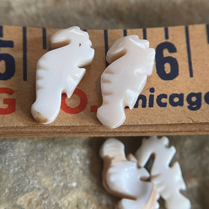 Cut shell seahorse beads