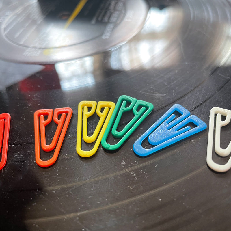 Rainbow of 80s plastic paper clips