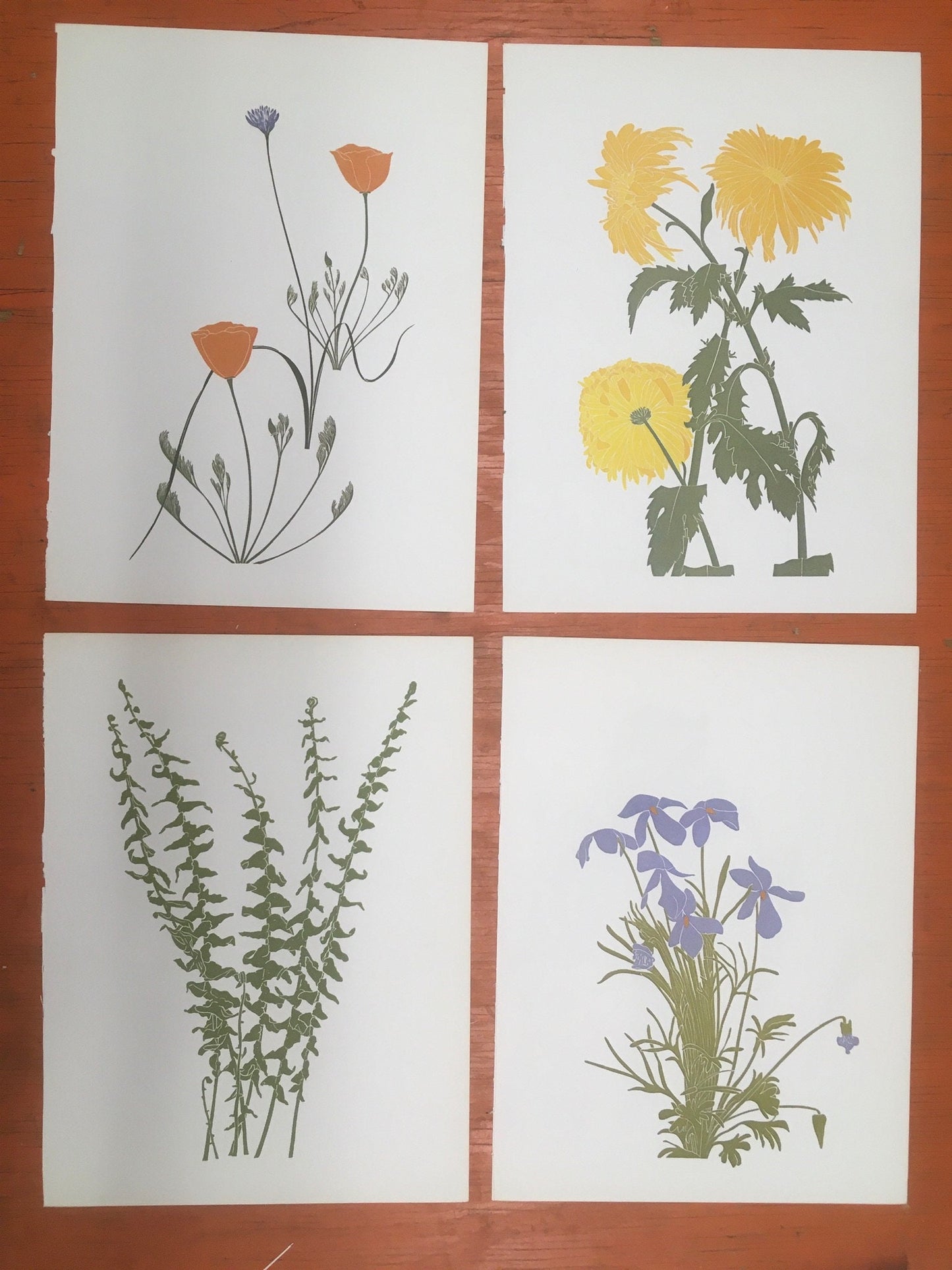 Four vintage bookplates featuring linocut botanical prints