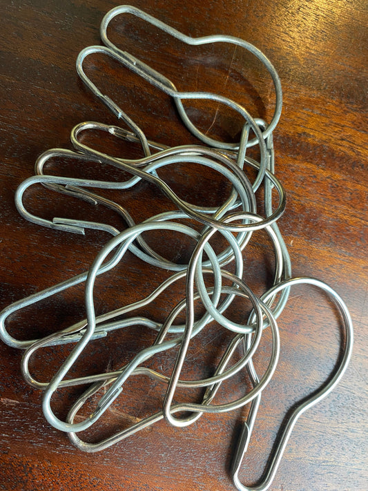 Trio of vintage wire loop fasteners