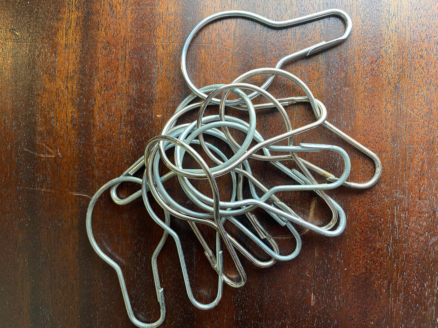 Trio of vintage wire loop fasteners